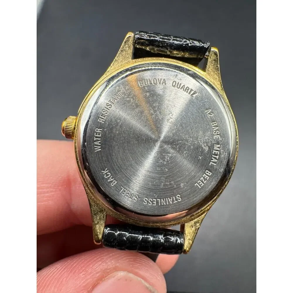 Caravelle by Bulova 48J83 Gold Tone Genuine Black Leather Strap Watch WR